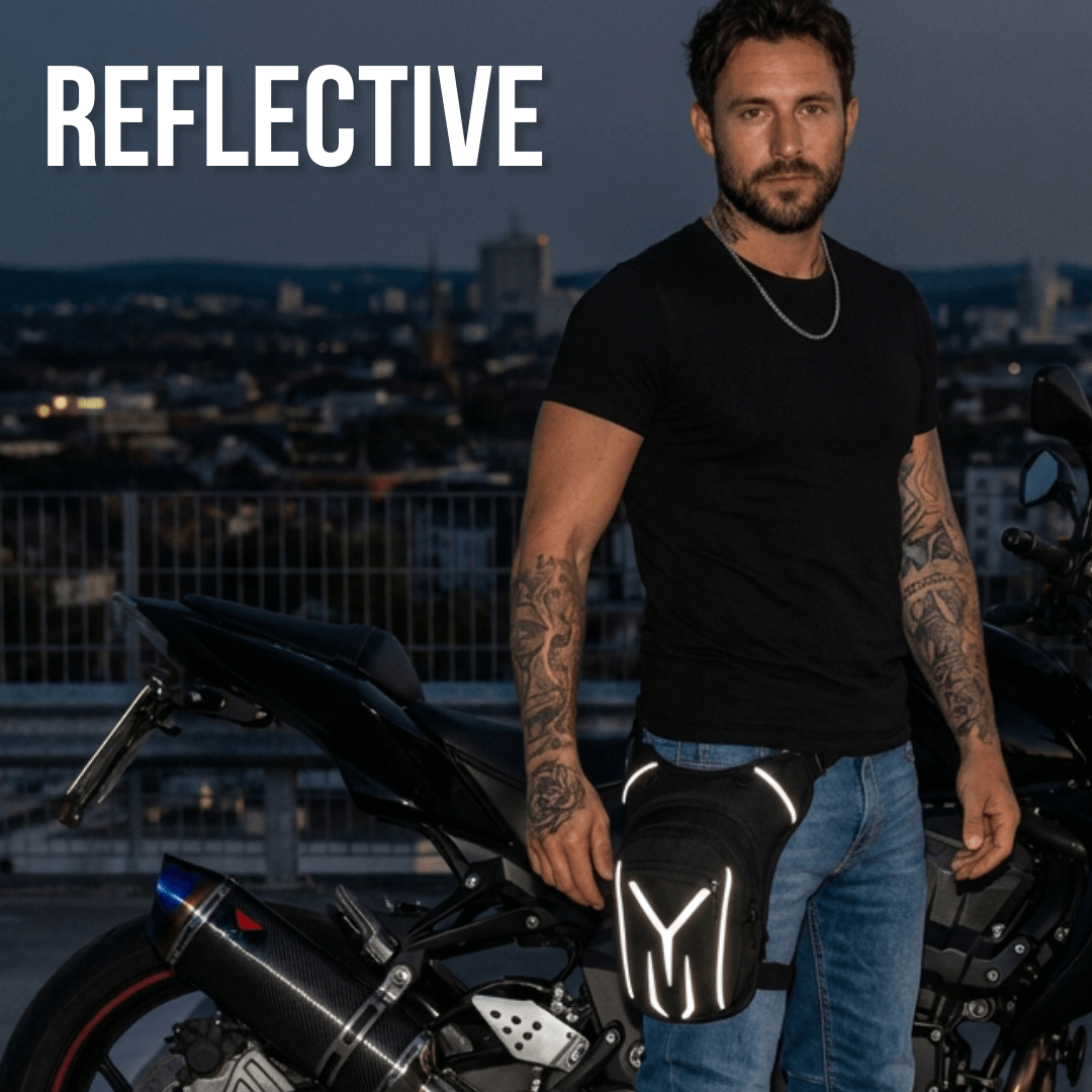 Man standing next to a motorcycle with reflective elements, cityscape in the background, showing the reflective elements of the havoc leg bag